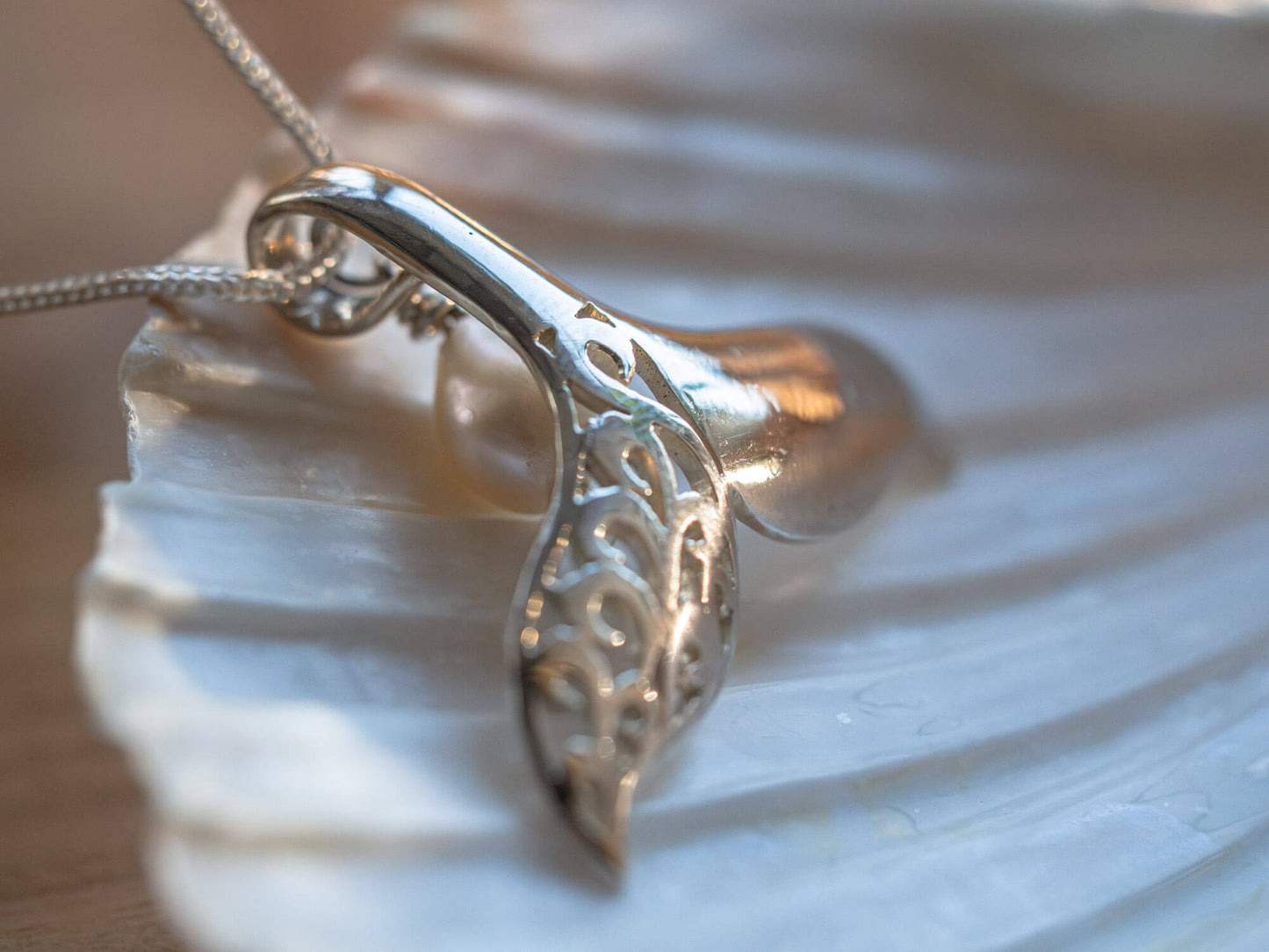 Sterling Silver Hand-Carved Whale Tail Necklace with Cultured Pearl